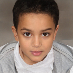 Joyful white child female with short  brown hair and brown eyes