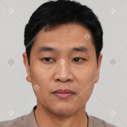 Neutral asian young-adult male with short  black hair and brown eyes