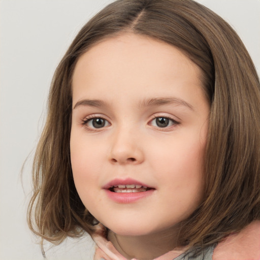 Joyful white child female with medium  brown hair and brown eyes