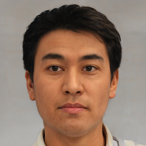 Neutral asian young-adult male with short  black hair and brown eyes
