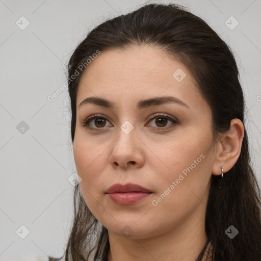 Neutral white young-adult female with long  brown hair and brown eyes