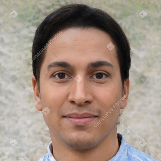 Joyful white young-adult male with short  black hair and brown eyes