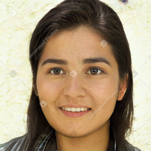 Joyful white young-adult female with long  brown hair and brown eyes