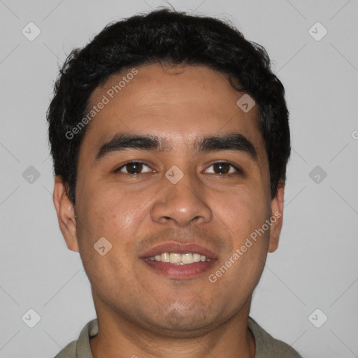 Joyful latino young-adult male with short  black hair and brown eyes