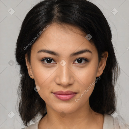 Joyful latino young-adult female with medium  brown hair and brown eyes