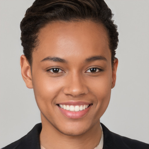 Joyful white young-adult female with short  brown hair and brown eyes