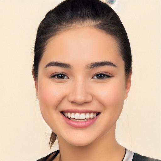 Joyful white young-adult female with medium  black hair and brown eyes