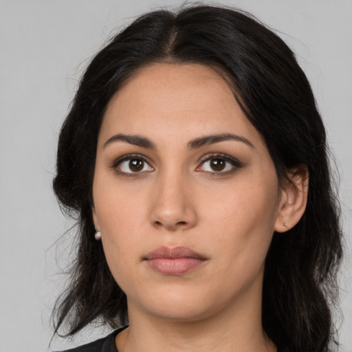 Neutral white young-adult female with long  black hair and brown eyes