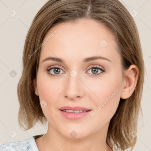 Joyful white young-adult female with medium  brown hair and blue eyes