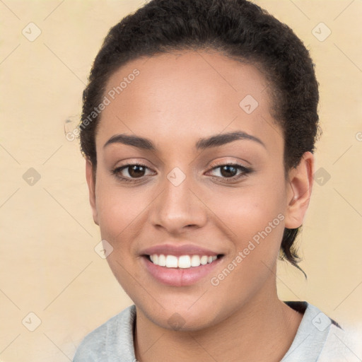 Joyful white young-adult female with short  brown hair and brown eyes