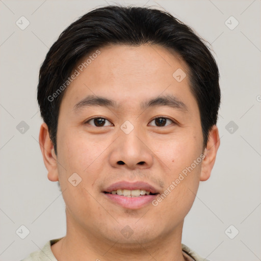 Joyful asian young-adult male with short  brown hair and brown eyes