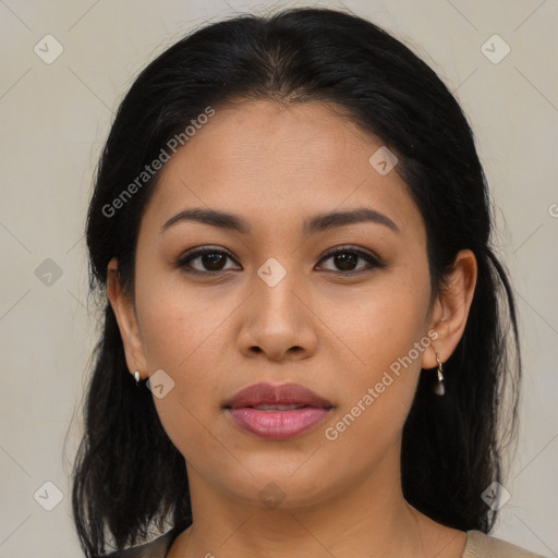 Joyful latino young-adult female with medium  brown hair and brown eyes