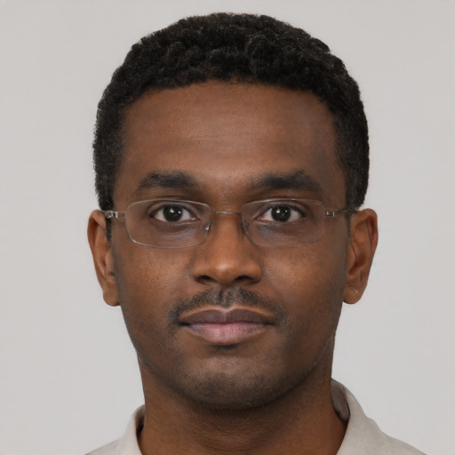 Neutral black young-adult male with short  black hair and brown eyes