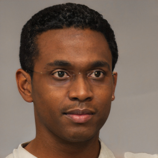 Neutral black young-adult male with short  black hair and brown eyes