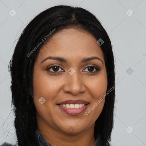 Joyful latino young-adult female with long  brown hair and brown eyes