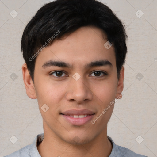 Joyful asian young-adult male with short  brown hair and brown eyes