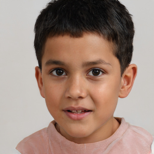 Joyful white child male with short  brown hair and brown eyes