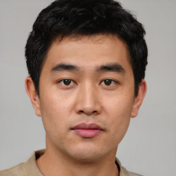 Neutral asian young-adult male with short  black hair and brown eyes