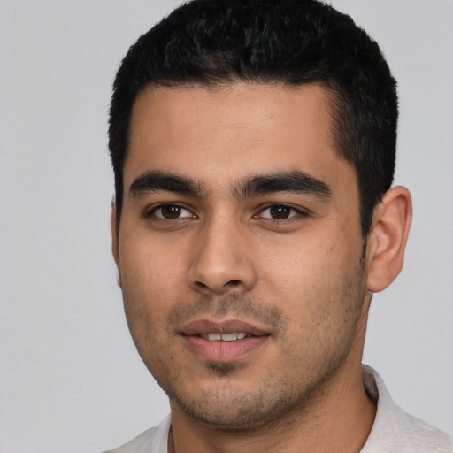 Neutral latino young-adult male with short  black hair and brown eyes