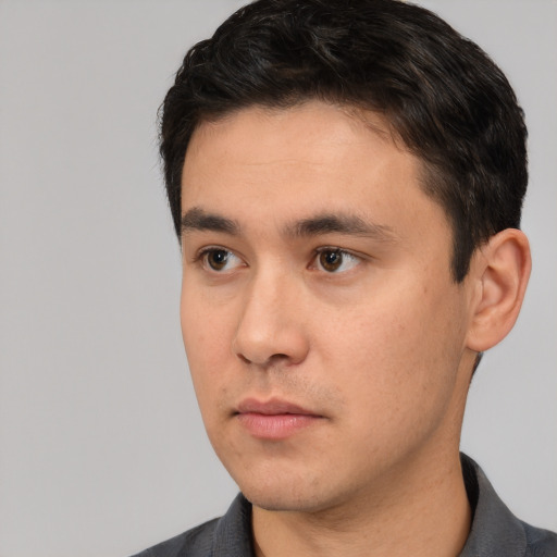 Neutral white young-adult male with short  black hair and brown eyes