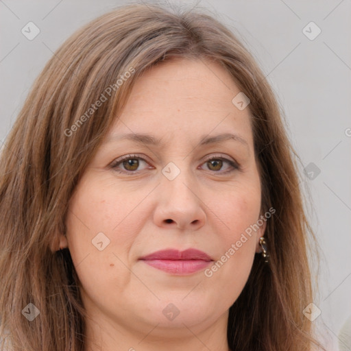 Joyful white adult female with long  brown hair and brown eyes