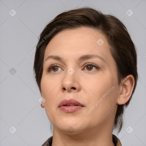 Neutral white young-adult female with medium  brown hair and brown eyes