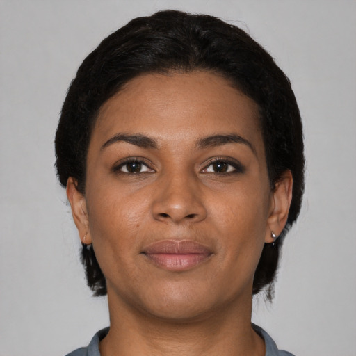 Neutral black young-adult female with short  brown hair and brown eyes