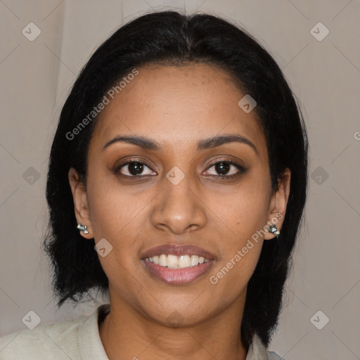 Joyful black young-adult female with medium  black hair and brown eyes