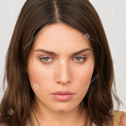 Neutral white young-adult female with long  brown hair and brown eyes