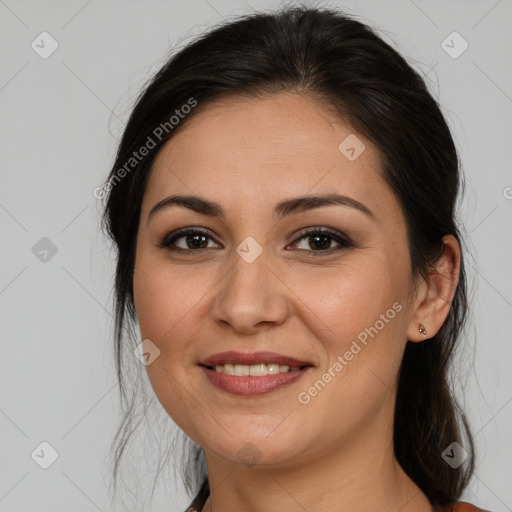 Joyful white young-adult female with long  brown hair and brown eyes