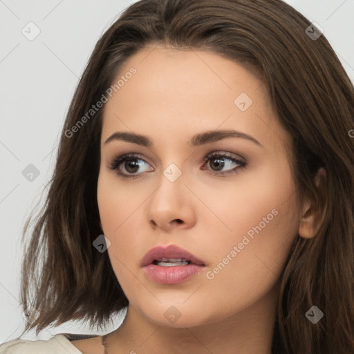 Neutral white young-adult female with long  brown hair and brown eyes