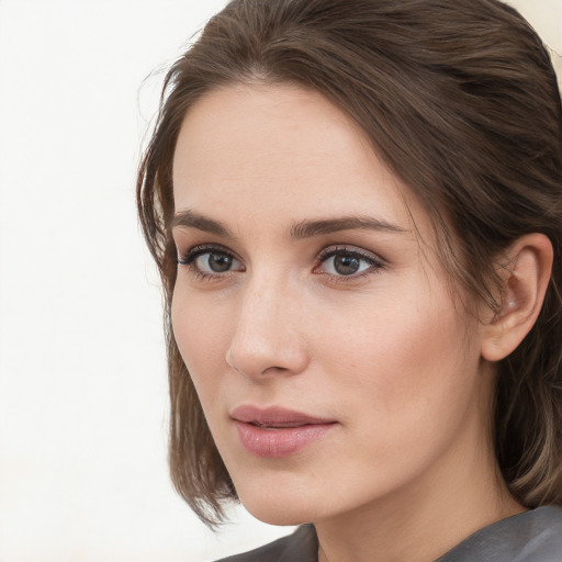 Neutral white young-adult female with medium  brown hair and grey eyes