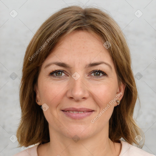 Joyful white adult female with medium  brown hair and brown eyes