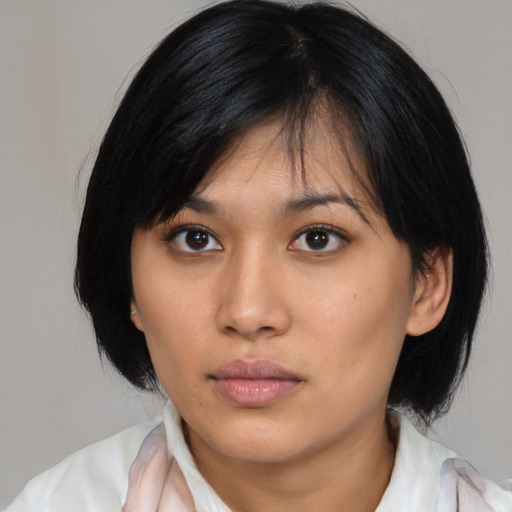 Neutral asian young-adult female with medium  black hair and brown eyes