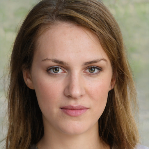 Joyful white young-adult female with long  brown hair and green eyes