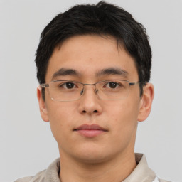 Neutral asian young-adult male with short  brown hair and brown eyes