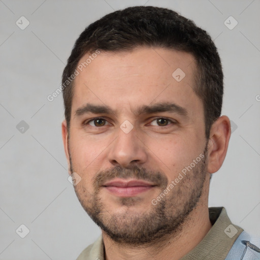 Neutral white young-adult male with short  black hair and brown eyes