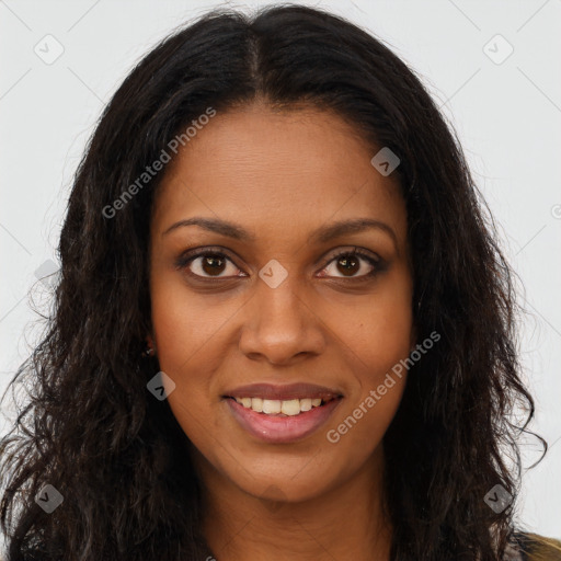 Joyful black young-adult female with long  brown hair and brown eyes