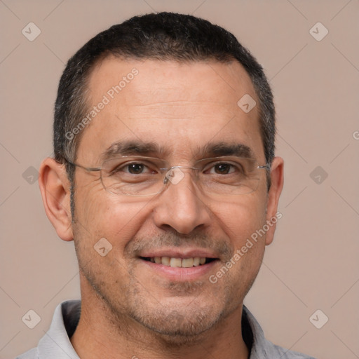 Joyful white adult male with short  black hair and brown eyes