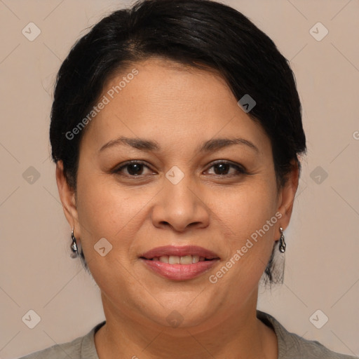Joyful white adult female with short  brown hair and brown eyes