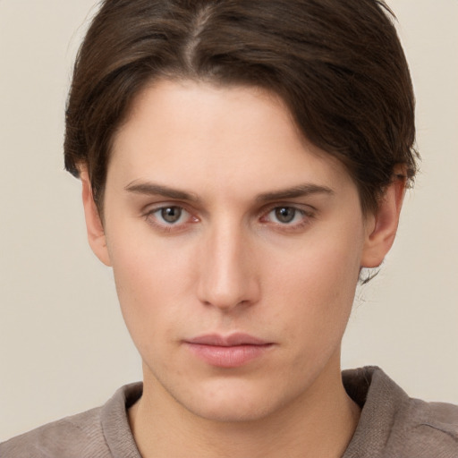 Neutral white young-adult female with short  brown hair and brown eyes