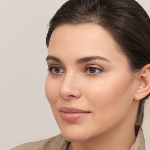 Neutral white young-adult female with medium  brown hair and brown eyes