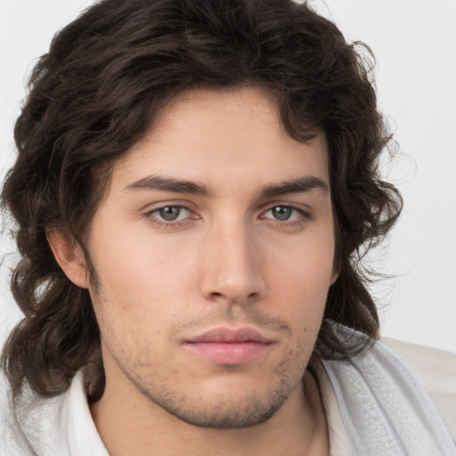 Neutral white young-adult male with medium  brown hair and brown eyes