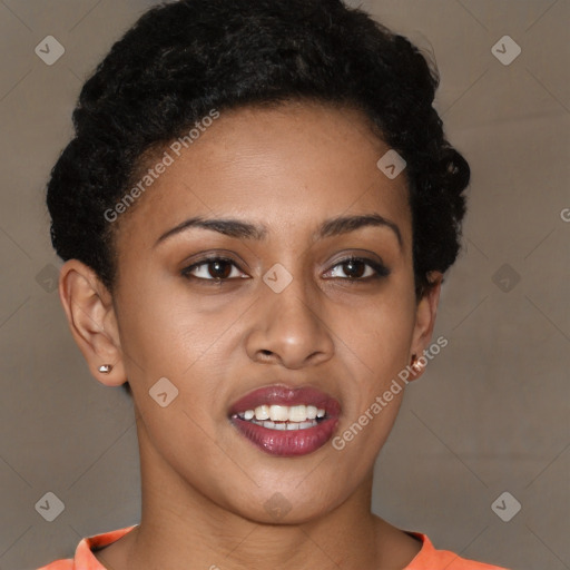 Joyful black young-adult female with short  brown hair and brown eyes