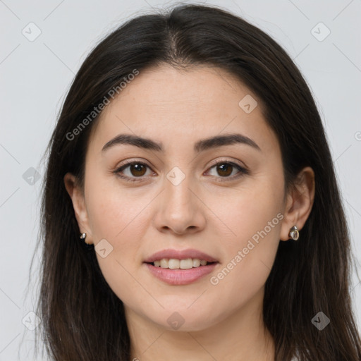 Joyful white young-adult female with long  brown hair and brown eyes