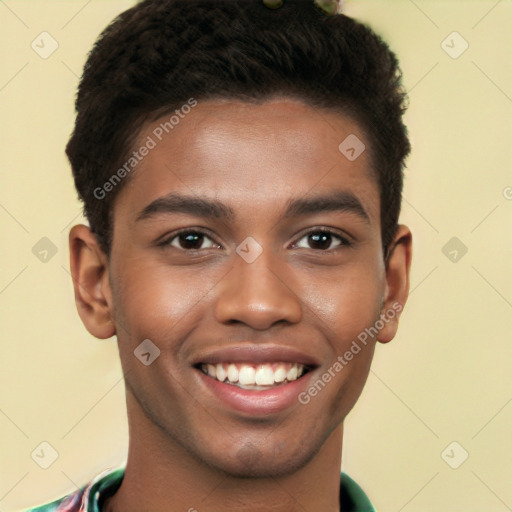 Joyful black young-adult male with short  brown hair and brown eyes