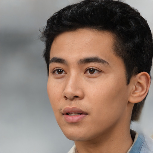 Neutral asian young-adult male with short  black hair and brown eyes