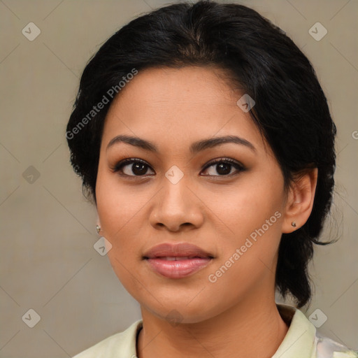 Joyful asian young-adult female with medium  brown hair and brown eyes