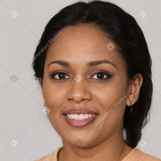 Joyful black young-adult female with medium  brown hair and brown eyes