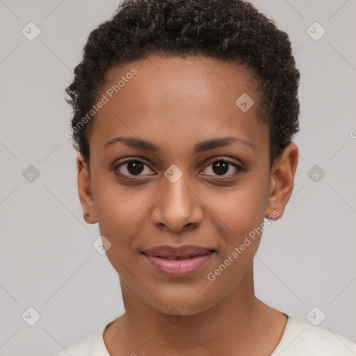 Joyful black young-adult female with short  brown hair and brown eyes